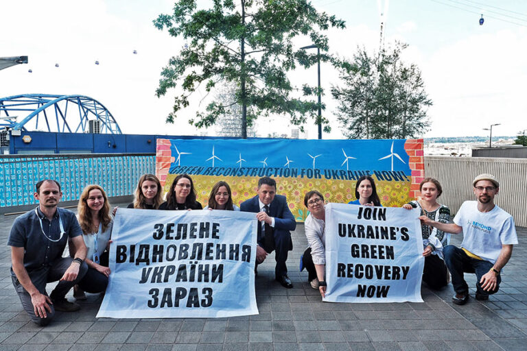 Ukrainian artists paint ‘live mural’ outside reconstruction conference to demand green recovery